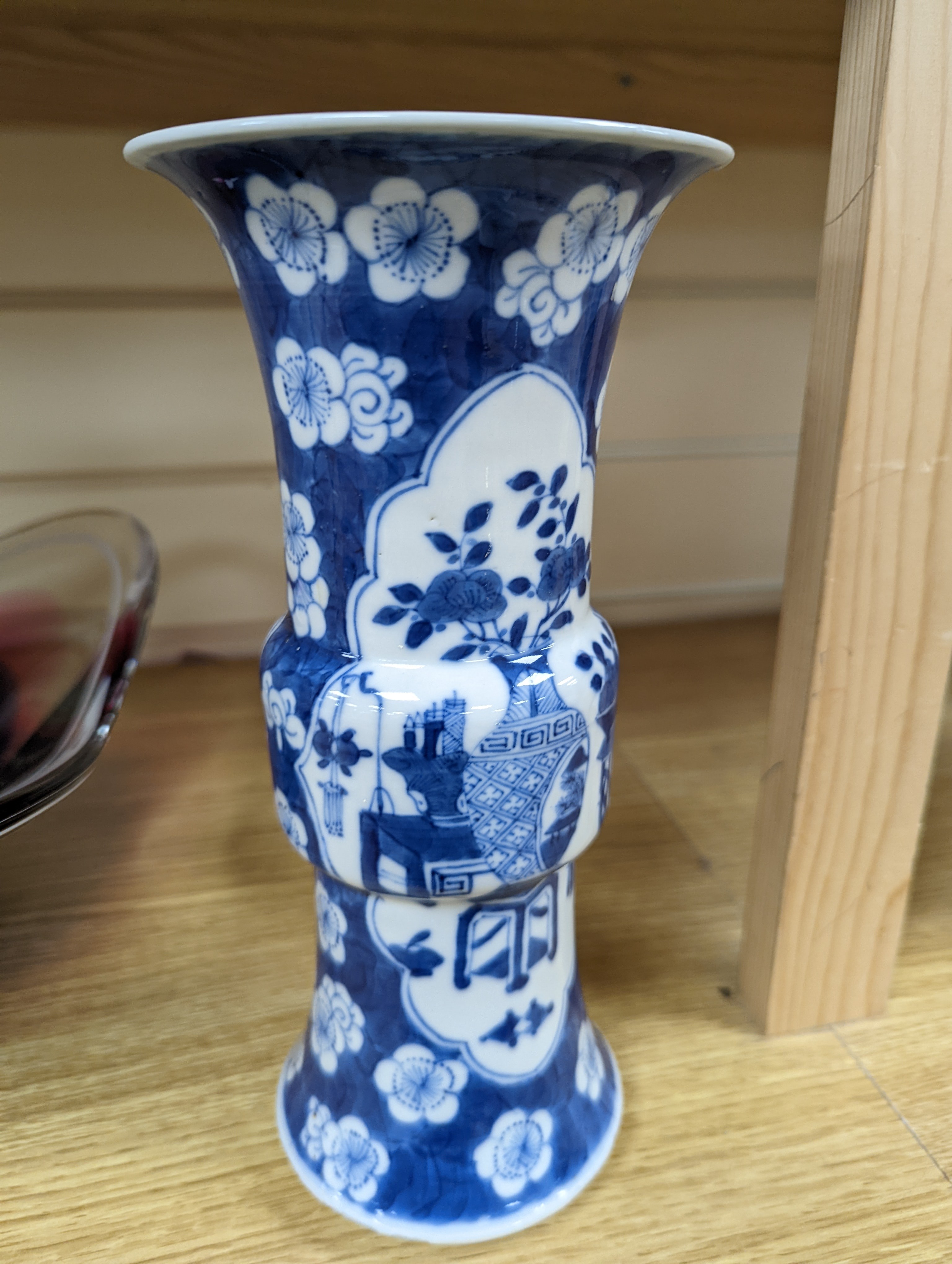 A 19th century Chinese blue and white prunus gu vase, 25 cms high.